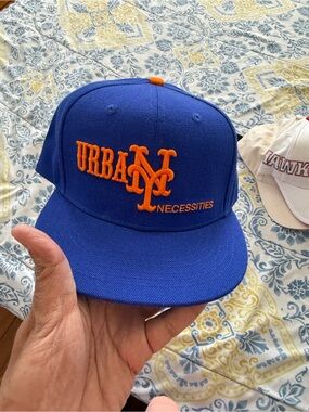 Urban Necessities Men's Royal Blue Snapback Hat with Orange Logo